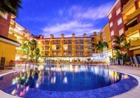 View of Costa Caleta Hotel at night