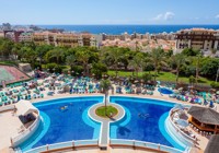 Views of pool and sea at Chatur Playa Real Resort