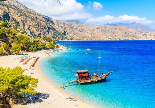 Beuatiful Beach And A Boat In Karpathos