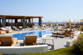 Swimming Pool and Sunbed Area at Sea Breeze Beach Resort Santorini