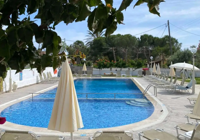 Pool And Sunlounges at Eleana Apartments