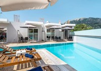 Outdoor Pool Area At Blue Star Aparthotel