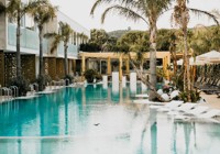 Outdoor Pool Area At The Elite Bay